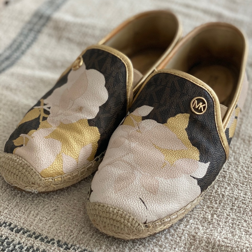 Michael Kors pvc floral design flats.